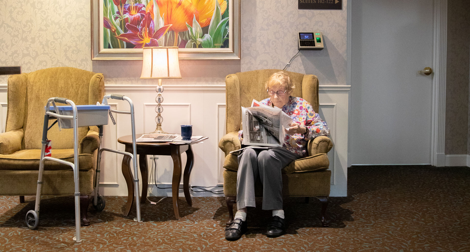 resident reading newspaper